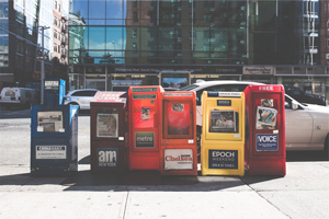 Some bins with posters on them